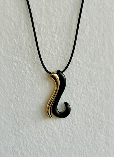 26 Lucky Charm in Brass plated in Gold & Black Metal