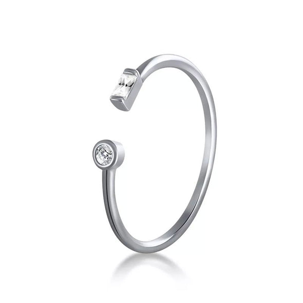 Round and Baguette Sterling Silver Ring plated in Rhodium