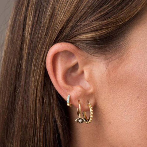 Starry Eyes Sterling Silver Earrings plated in 18K Gold
