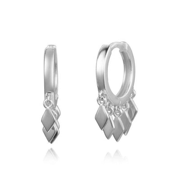 Twiga Sterling Silver Earrings plated in Rhodium